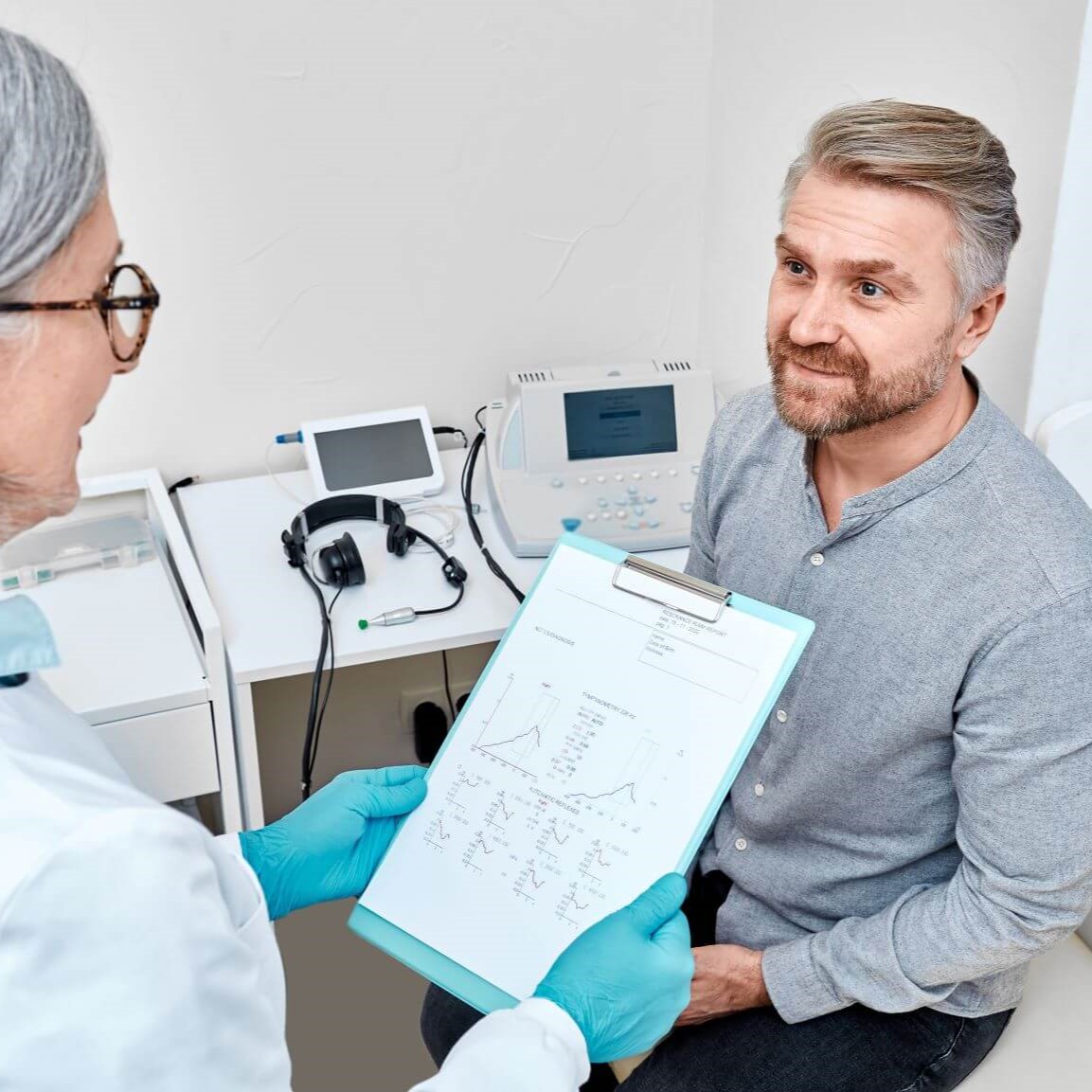 man getting read hearing test